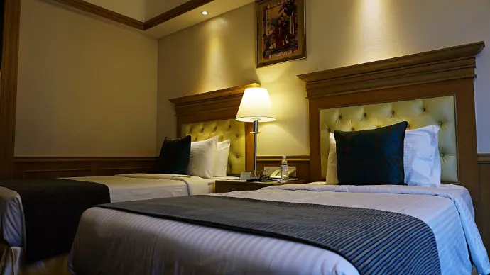 a couple of beds sitting next to each other